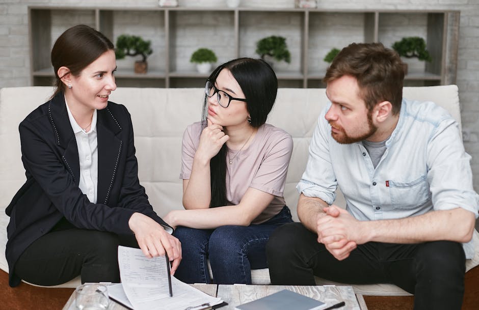 Three adults discussing business inside, focused on cooperation and strategy